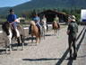 Centered Riding Instructor Sue Falkner-March describing a new exercise to a group of riders.